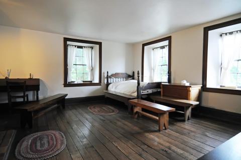 Jailer's bedroom in the Carthage Jail where Hyrum was killed and where Joseph Smith and John Taylor were shot. Taken in 2008.