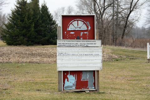 View of an old door identifying the site of an LDS chapel in Webster. Taken in 2018.